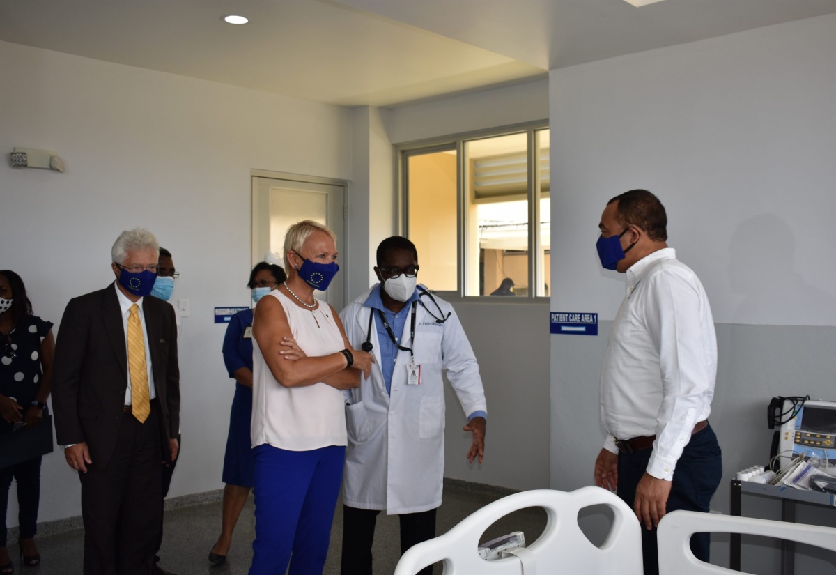 Minister of Health and Wellness, Dr. the Hon. Christopher Tufton (right); Head of the Delegation of the European Union to Jamaica, Her Excellency Malgorzata Wasilewska (second left); and German Ambassador to Jamaica, Dr. Bernd von Munchow-Pohl (left), listen keenly to Consultant Anaesthesiologist at the St. Ann's Bay Regional Hospital, Dr. Peter Scarlett (third left), during a tour of the newly opened High-Dependency Unit (HDU) building, recently.   

