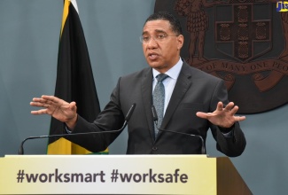 Prime Minister, the Most Andrew Holness addresses a media briefing on Sunday (June 14), to announce a State of Public Emergency (SOE) in the Kingston Western and Kingston Central Police divisions. The briefing was held at the Office of the Prime Minister Media Centre.