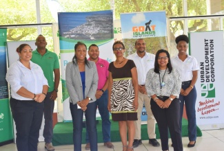 Back row: Damion Whyte, Environmental Officer, UDC; Dr Sean Townsend, Manager, Natural Resource Management & Environment Planning; Kevin Douglas, Project Manager, Jamaica Red Cross- Resilient Islands by Design Project; Kimmoy Tulloch, Field Officer Jamaica Red Cross- Resilient Islands by Design Project. 
Front Row: Dr Natainia Lummen, Climate Change Adaptation Specialist, Resilient Islands by Design Project; Loy Malcolm, Deputy General Manager, Planning Development and Project Management, UDC; Donna Blake, Jamaica Programme Director, TNC; Sara Simpson, Director, Natural Resource Management & Environment Planning, UDC.