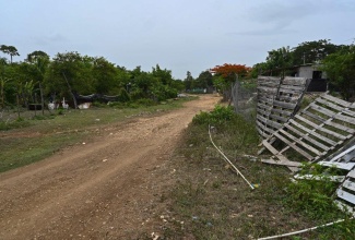 A section of the roadway in the Treadlight community of Clarendon, which will be rehabilitated at a cost of $150 million under the Jamaica Social Investment Fund' (JSIF) Integrated Community Development Project.

