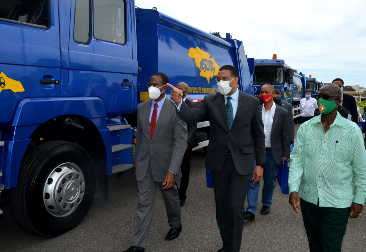 PM Hands Over 20 New Garbage Trucks To NSWMA