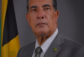 Minister without Portfolio in the Office of the Prime Minister, Hon. Homer Davis