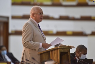 Minister of Justice, Hon. Delroy Chuck, opens the debate on the Dogs (Liability for Attacks) Act 2020 during the recent sitting of the House of Representatives at the Jamaica Conference Centre in downtown Kingston. 

