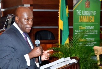 Chief Justice, Brian Sykes, speaks at the recent Conversation with the Judiciary, held on October 29 at the Supreme Court, downtown Kingston.
