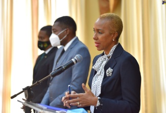 Minister of Education, Youth and Information, Hon. Fayval Williams (right), addresses a virtual post-Cabinet press briefing  on November 25. Others (from left) are Minister of Agriculture and Fisheries, Hon. Floyd Green; and Minister of State in the Ministry of Education, Youth and Information, Hon. Robert Morgan.