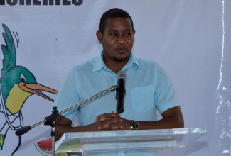 Minister of Agriculture and Fisheries, Hon. Floyd Green, addresses a ceremony at the National Irrigation Commission's New Forrest Office in Manchester on December 11 to hand over equipment valued at $29 million to the NIC and the Water Resources Authority (WRA) under the Essex Valley Agriculture Development Project (EVADP).

 