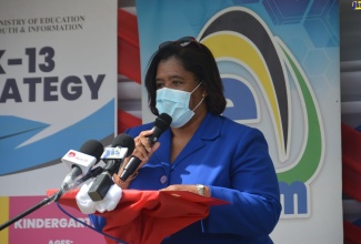 Regional Director for the Ministry of Education, Youth and Information's region four, Dr. Michelle Pinnock, speaking at a Tablets in Schools handover ceremony held at the Lucea Primary School in Hanover, recently.