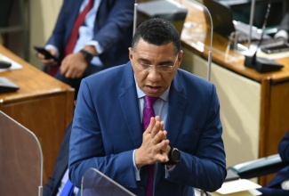  Prime Minister, the Most Hon. Andrew Holness,  addresses the House of Representatives on April 20.

 