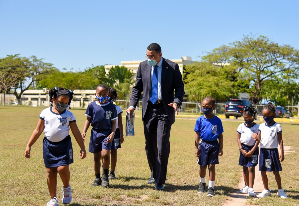 PM Reads To Children At Jamaica House