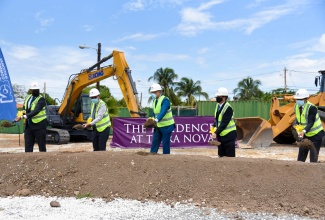 Prime Minister, the Most Hon. Andrew Holness (centre), breaks ground for the construction of a new luxury 14-storey residential complex on property adjacent to the Terra Nova All-Suite Hotel on Waterloo Road in Kingston, on Tuesday (June 1).  Also participating (from left) are Senior Advisor and Strategist in the Tourism Ministry, Delano Seiveright, who represented Tourism Minister, Hon. Edmund Bartlett; Minister of Science, Energy and Technology, Hon. Daryl Vaz; one of the developers of the property, Andrew Hussey; and Mayor of Kingston, Senator Councillor Delroy Williams. 

