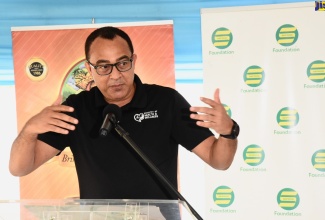 Minister of Health and Wellness, Dr. the Hon. Christopher Tufton, addresses ceremony for the adoption of the Seaforth Health Centre in St. Thomas, by the Seprod Foundation and Canco Ltd. The event was held at the centre on June 17.