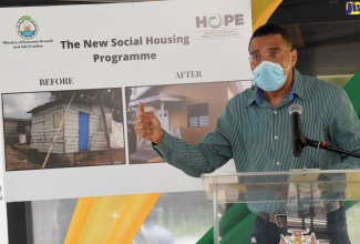 Prime Minister, the Most Hon. Andrew Holness, addresses a social housing function in Farm Pen, St. Mary, on  Friday  (July 16).