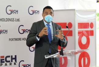 Prime Minister, the Most Hon. Andrew Holness, addresses the opening of an IBEX Business Process Outsourcing (BPO) facility at the G Tech Park in Portmore, St. Catherine, on Friday, (July 23).

