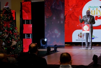 Tourism Minister, Hon. Edmund Bartlett, delivers the keynote address during the opening ceremony for the seventh ‘Christmas in July’ tradeshow at The Jamaica Pegasus hotel in New Kingston, on Thursday (July 22).

