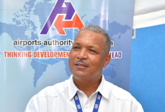 President and Chief Executive Officer of the Airports Authority of Jamaica, Audley Deidrick, speaks at the  recent handover of a police post at the Ian Fleming International Airport in st. Mary.

