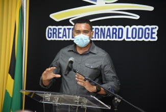 Prime Minister, the Most Hon. Andrew Holness, addressing a press conference at the SCJ Holdings Limited in June.  Photo: Adrian Walker

