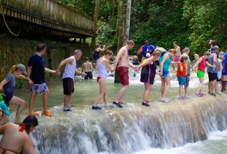 The world-renowned Dunn’s River Falls in Ocho Rios, St. Ann, remains a popular destination for tourists.

