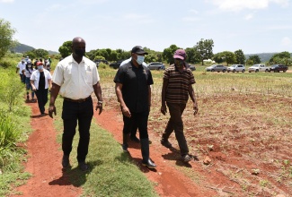 L-R Minister Green, MP Franklin Witter and farmer Byron McCarty - Dunder Hill St. Elizabeth.
