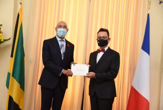 Governor – General, His Excellency the Most Hon. Sir Patrick Allen (left), receives Letters of Credence from Ambassador -designate of the French Republic to Jamaica, His Excellency Olivier Guyonvarch, on October 15 at King’s House.