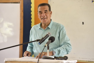 Minister of State in the Ministry of Local Government and Rural Development, Hon. Homer Davis. 

