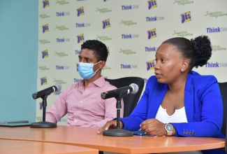 Chief Executive Officer (CEO) of door-stop food-delivery company, Road Jockey, Rajiv Maragh (left), listens attentively as the company’s Chief Operating Officer (COO), Velverine Harrison, speaks during a Jamaica Information Service (JIS) ‘Think Tank’ at the agency’s regional office in Montego Bay, St. James, on September 29. 