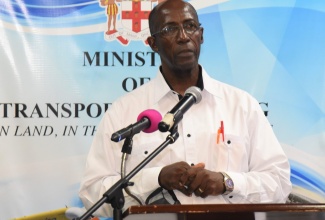 President of the National Council of Taxi Associations (NCOTA), Allan Blair, addresses the launch of the Transport Operators COVID-19 Initiative, at the Ministry of Transport and Mining, on Tuesday, October 5.