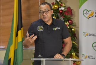 Minister of Health and Wellness, Dr. the Hon. Christpher Tufton, addresses a virtual COVID-19 conversation press conference on December 22.

