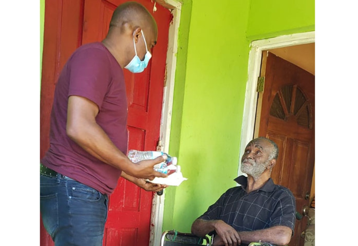 Correctional Officer Feeds St. Ann Shut-Ins On January 1