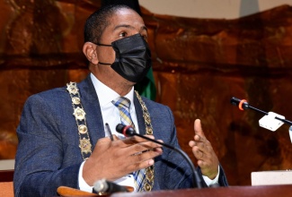 Mayor of Kingston, Senator Councillor Delroy Williams, addresses the monthly meeting of the Kingston and St. Andrew Municipal Corporation (KSAMC),  on January 11, at the Jamaica Conference Centre in downtown Kingston.