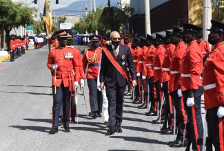 Governor-General, His Excellency the Most Hon. Sir Patrick Allen, inspects the Guard of Honour mounted by members of the Jamaica Defence Force, at the 2022/23 ceremonial opening of Parliament, on Thursday (February 10).