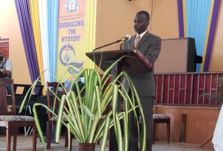 Permanent Secretary, Ministry of Culture, Gender, Entertainment and Sport, Denzil Thorpe, delivers message from Minister of Culture, Gender, Entertainment and Sport, Hon. Olivia Grange, at the International Women’s Day Church Service, held on Sunday (March 6) at the Boulevard Baptist Church in Kingston.