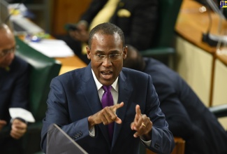 Minister of Finance and the Public Service, Dr. the Hon. Nigel Clarke, opens the 2022/23 Budget Debate in the House of Representatives on Tuesday (March 8).