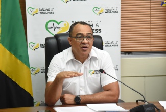 Minister of Health and Wellness, Dr. the Hon. Christopher Tufton, addresses a COVID Conversations digital press conference, yesterday, Thursday (April 28).