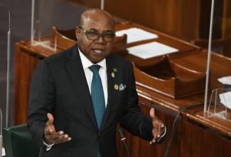 Minister of Tourism, Hon. Edmund Bartlett, highlights a point as he opens the 2022/23 Sectoral Debate in the House of Representatives on Tuesday (April 5).