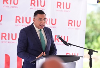 Prime Minister, the Most Hon. Andrew Holness, addresses the official ground-breaking ceremony for the 700-room RIU Aquarelle in Coopers Pen, Falmouth, on April 20,