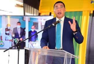 Prime Minister, the Most Hon. Andrew Holness, addresses recent confrontations between the security forces and residents of  Denham Town, during a ceremony for the hand over of a housing unit under the social housing programme in August Town, St. Andrew, on Friday (May 6).