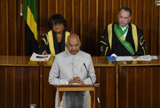 President of the Republic of India, His Excellency, the Hon. Ram Nath Kovind, addresses a joint sitting of the Houses of Parliament on Tuesday (May 17). In the background are Speaker of the House of Representatives, Marisa Dalrymple Philibert (left); and President of the Senate, Senator Tom Tavares-Finson.