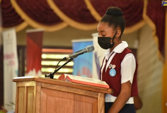 Head Girl of the Half-Way Tree Primary School, Asha-Rae Morgan, delivers the scripture reading during the Child Month Church Service held at the Eastwood Park New Testament Church of God in St. Andrew on Sunday (May 1). Hosted by the Ministry of Education and Youth and the National Child Month Committee, the service was held under the theme ‘Listen Up! Children’s Voices Matter’.

