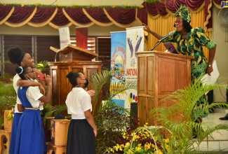 Chairperson of the National Child Month Committee, Dr. Pauline Mullings (at lectern), engages students participating in the Child Month Church Service held at the Eastwood Park New Testament Church of God in St. Andrew on Sunday (May 1). Hosted by the Ministry of Education and Youth and the National Child Month Committee, the service was held under the theme ‘Listen Up! Children’s Voices Matter’.

