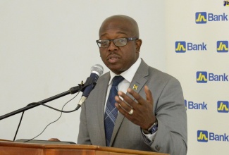 Minister of Agriculture and Fisheries, Hon. Pearnel Charles Jr., addresses the Caribbean Food and Safety Summit on May 10, at the Medallion Hall Hotel in St. Andrew.

 

 