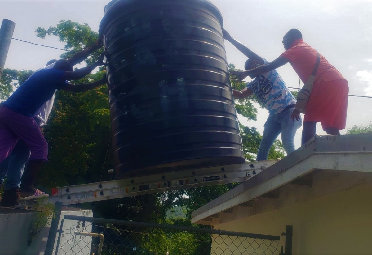 NWC Improves Water Flow At Cacoon Primary And Infant Jamaica