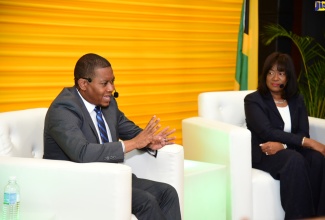 Minister without Portfolio in the Office of the Prime Minister, Hon. Floyd Green (left), engages in discussion about the Government’s digitisation process with Chief Digital Officer and Corporate Vice President, Microsoft US Global Technology Leader, Jacky Wright, during a special ‘Riverside Chat’ during the Jamaica 60 Diaspora Conference, at the Ministry of Foreign Affairs and Foreign Trade office in downtown Kingston on Tuesday (June 14).