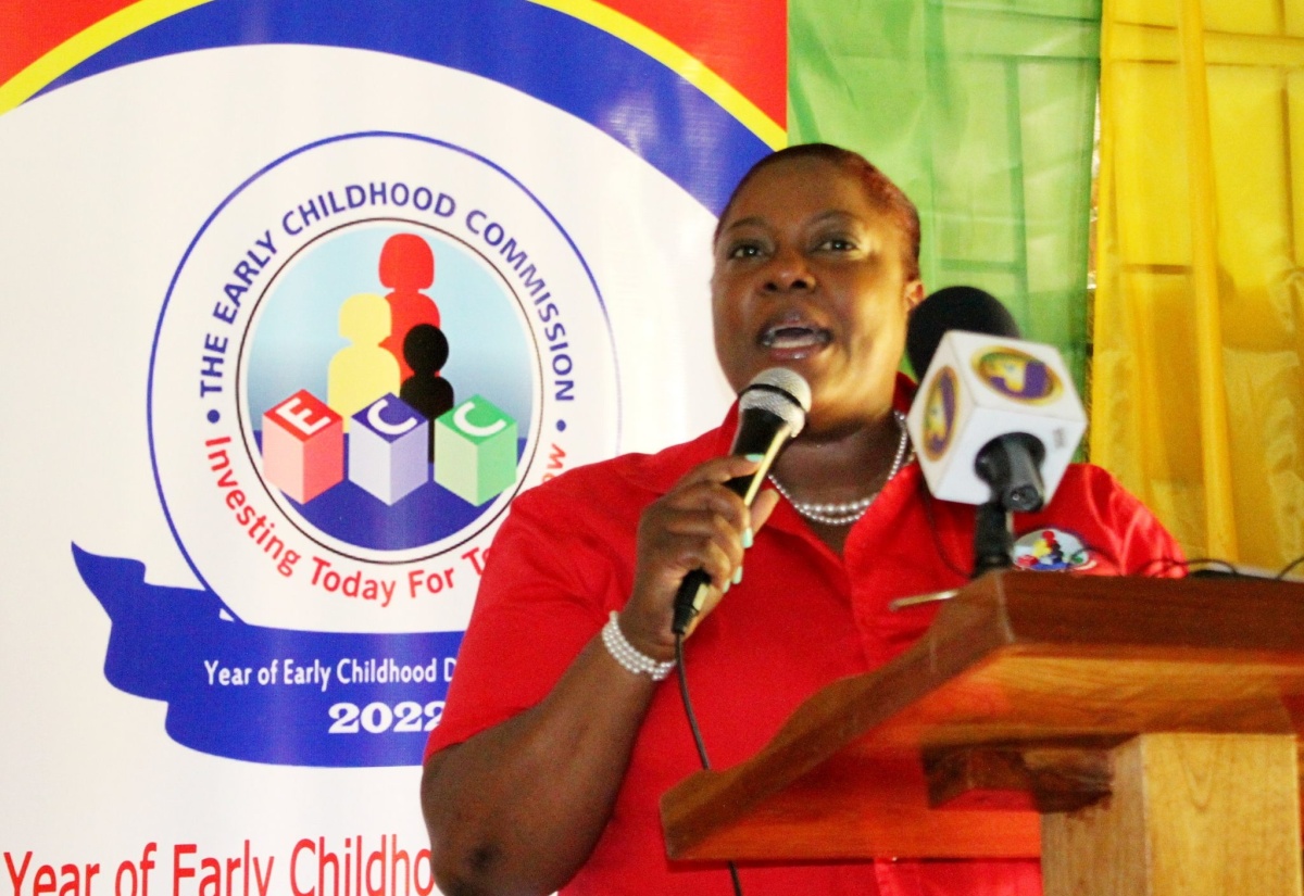 Community Relations Manager at the Early Childhood Commission (ECC), Tanisha Miller, addresses a recent mental health forum for parents and students, held at  Paul Mountain Primary School in St. Catherine.