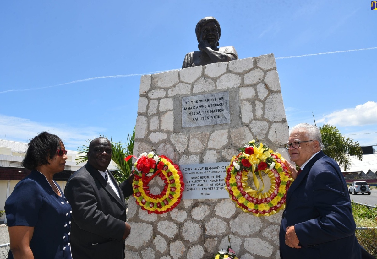 PHOTOS: Minister Samuda Receives Courtesy Call from ILO Official, Lays Wreath At Aggie Bernard Monument