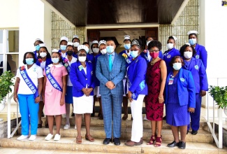 Prime Minister the Most Hon. Andrew Holness (front row, centre) and President of the Nurses Association of Jamaica, Patsy Edwards Henry (third left), with finalists in the LASCO/Nurse and Nursing Student of the Year Competition, during a courtesy call at Jamaica House on July 20.

