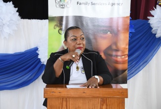 Chief Executive Officer of the Child Protection and Family Services Agency (CPFSA), Rosalee Gage-Grey, addresses the agency’s Transitional Living Expo for the Western and Northeast Regions, at the St. John Methodist Church Hall in Montego Bay, St. James,  on July 19. 