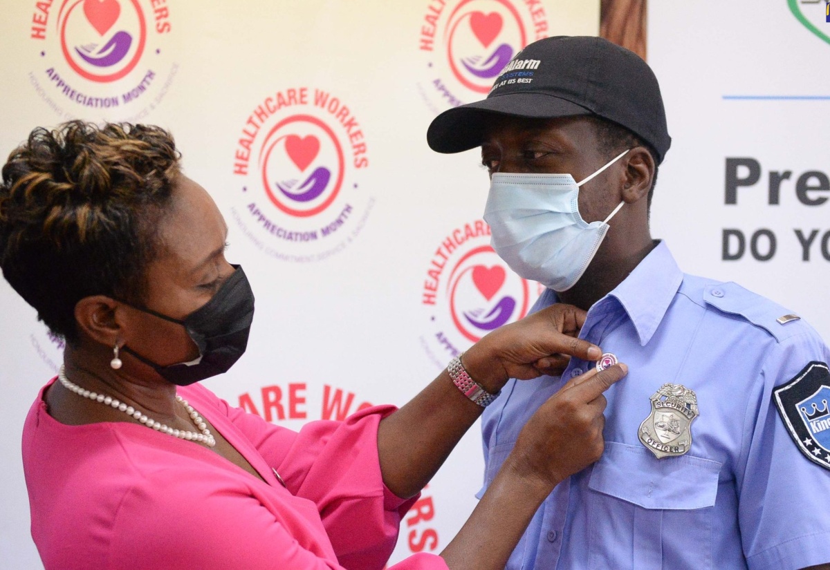PHOTOS: State Min. Cuthbert-Flynn Participates in Healthcare Workers Pinning Ceremony