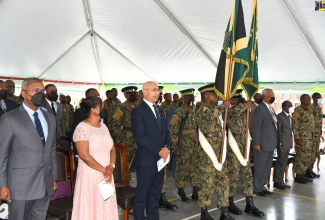 Their Excellencies, Governor-General, the Most Hon. Sir Patrick Allen (third left) and Lady Allen (second left); Force Executive Officer, Brigadier Markland Lloyd; and other congregants, stand in observance of the JDF Standard presentation ceremony at the Jamaica National Drumhead Church Service on Sunday (July 24). It was held at the Jamaica Defence Force (JDF) Curphey Barracks, Up Park Camp, St. Andrew.  