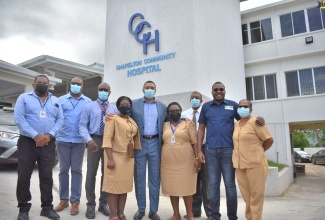 Prime Minister, the Most Hon. Andrew Holness (centre) and Member of Parliament (MP) for Clarendon North Central, and Minister without Portfolio in the Office of the Prime Minister with responsibility for Information, Hon. Robert Morgan (second right), in front of the soon-to-be completed Chapelton Community Hospital in Clarendon North Central, following a tour of the facility on Wednesday (July 20). The hospital is currently undergoing upgrading and expansion works. Also pictured (from left) are: Regional Director for the Southern Regional Health Authority (SRHA), Michael Bent; Senior Projects Manager, SRHA, Damion Morgan; Senior Medical Officer, May Pen Hospital, Dr. Bradley Edwards; Senior Public Health Nurse for Clarendon, Karen Nelson; Public Health Nurse, Olufunke Adetola; Parish Manager for Clarendon Health Services, SRHA, Joseph Grant; and Public Health Nurse, Antonette Smith Pinnock.