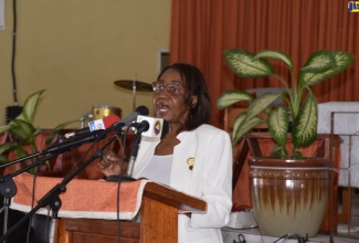 Custos of St. Thomas, Marcia Bennett, addresses the commissioning ceremony for 40 new Justices of the Peace in the parish on Thursday (July 21) at the Yallahs Baptist Church.   